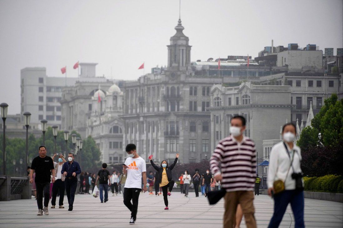 Noise, traffic and commuters return as Shanghai lifts lockdown
