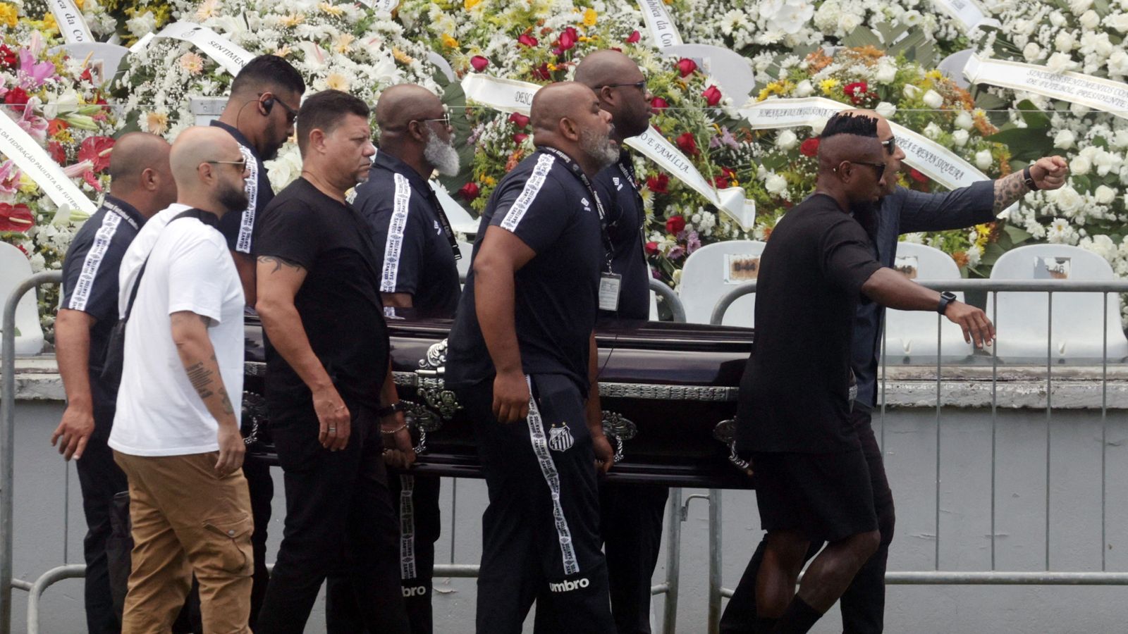 Pele's coffin carried to stadium as Brazil bids farewell to football icon
