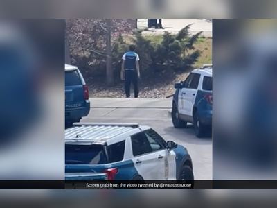 Watch: Amazon Executive Delivers Package During Police Standoff In US